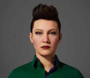 File photo of Agent Skyler Dupri, a Caucasian woman with swept-up black hair, winged eye makeup, and a dark green button-down shirt.